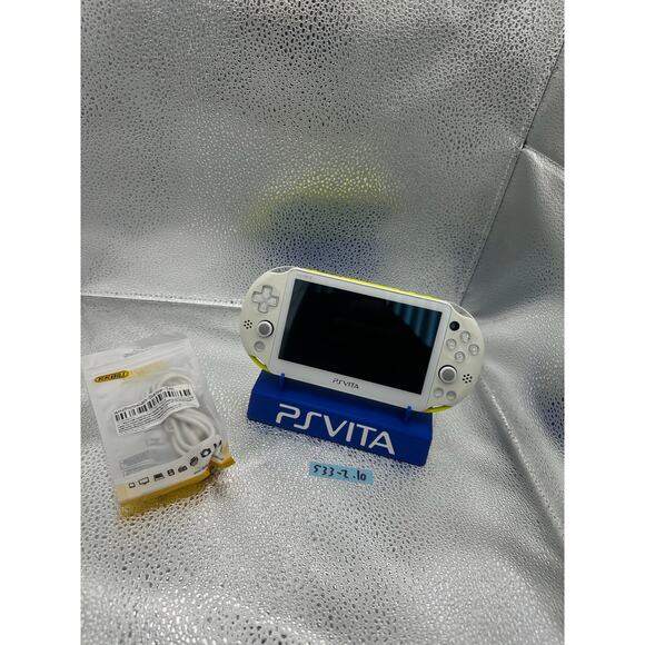white/yellow with a dash of light blue ps vita 2000 w/charger - Picture 1 of 8